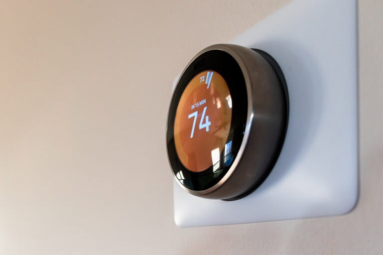 An image os a round smart thermostat.